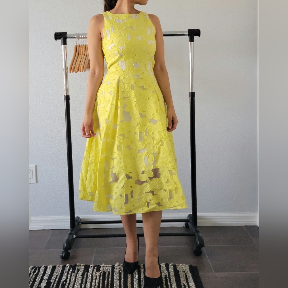 Yellow lace dress by Antonio Melani